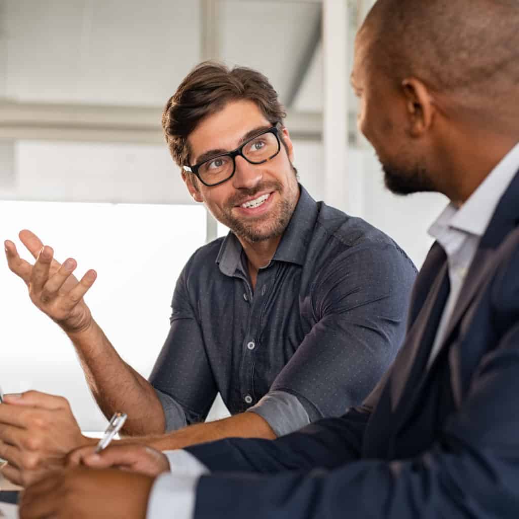 Businessman discussing project with colleague